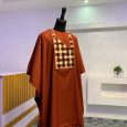 Orange agbada set with interlocking embroidery